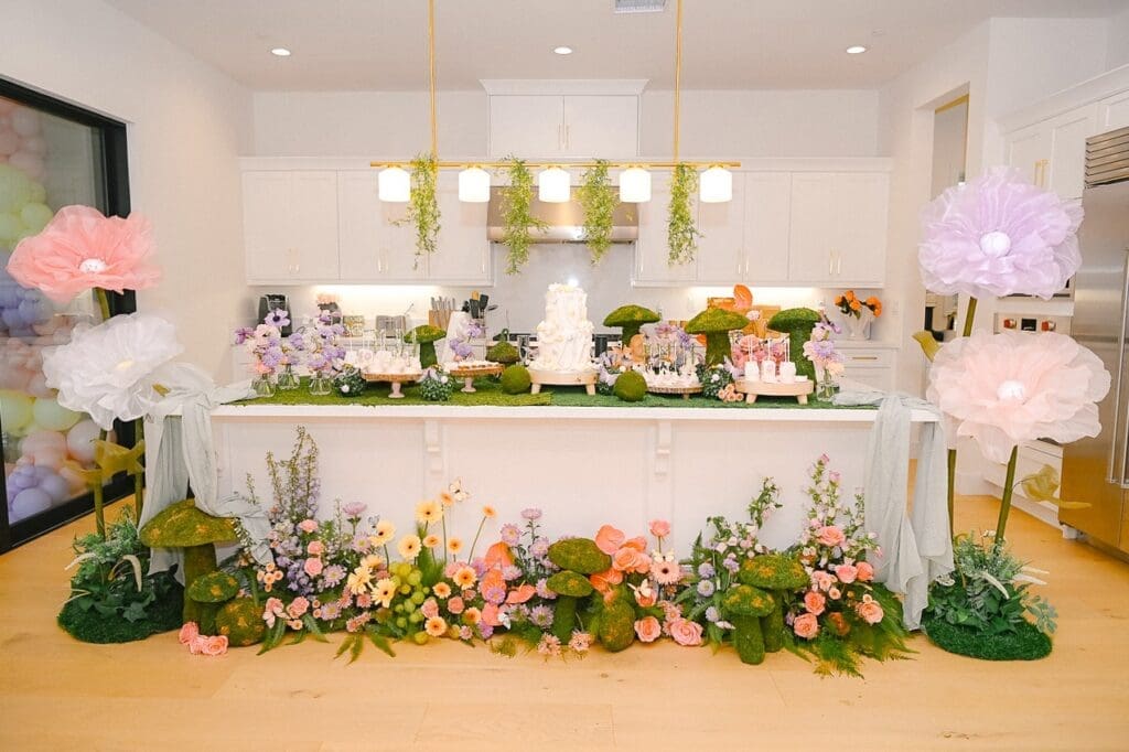 Birthday party decore with giant flowers for a garden party birthday party